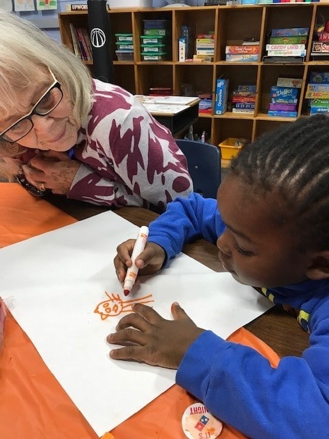 margaret and boy drawing